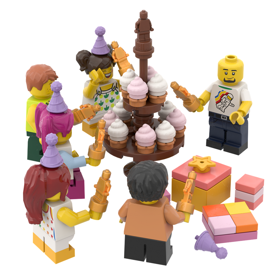 Minifigures in party hats celebrating around a brick-built dessert tower and presents