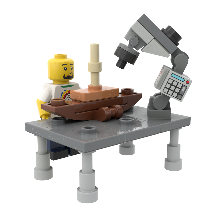 A minifig at a workbench building a brick ship